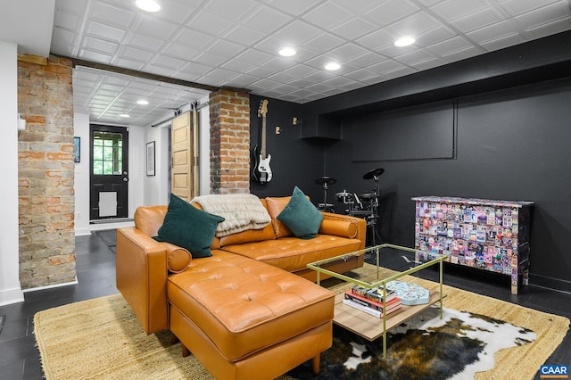 living room with baseboards and recessed lighting