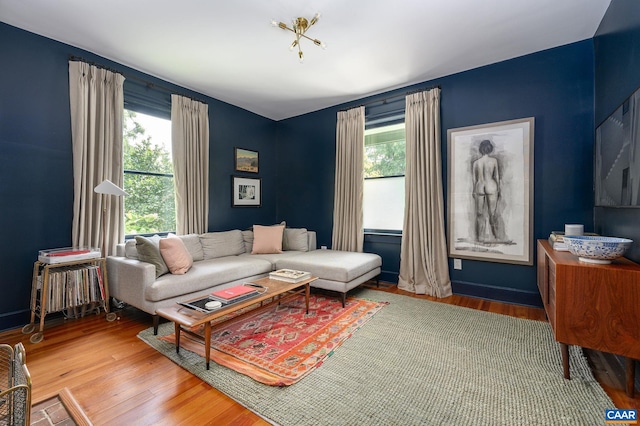 living area featuring plenty of natural light and wood finished floors