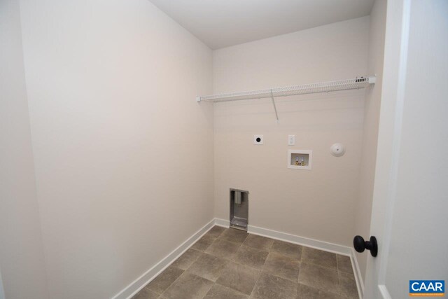 laundry area featuring laundry area, electric dryer hookup, baseboards, and hookup for a washing machine