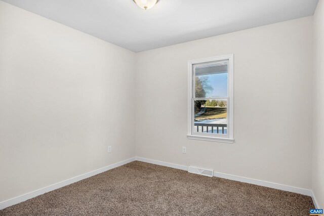 view of carpeted spare room