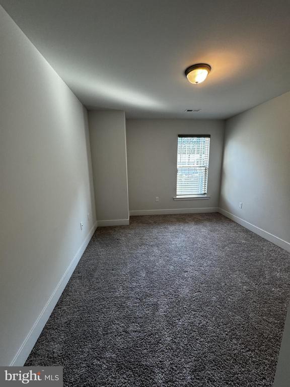 102 Monroe St, Locust Grove, VA 22508 - spare room with carpet and baseboards