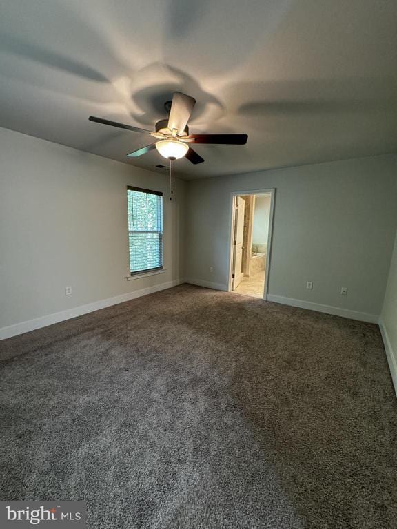102 Monroe St, Locust Grove, VA 22508 - carpeted empty room with ceiling fan and baseboards