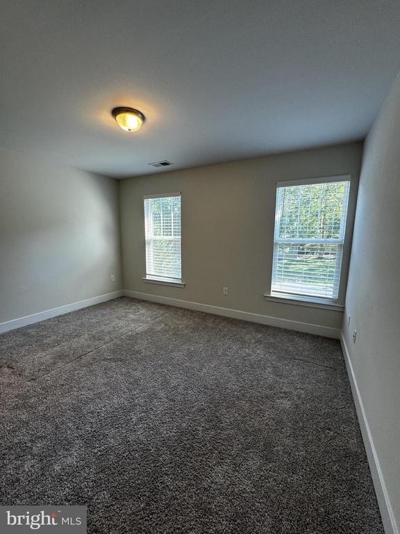 102 Monroe St, Locust Grove, VA 22508 - unfurnished room featuring carpet flooring and baseboards