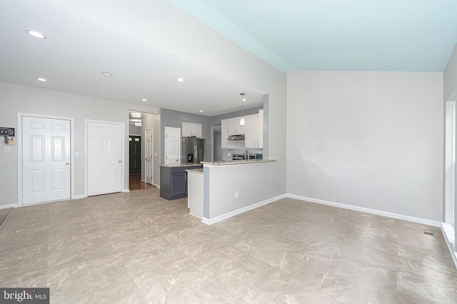  - unfurnished living room featuring recessed lighting