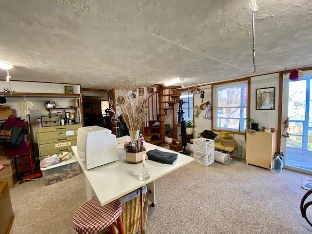 basement with carpet flooring and stairway
