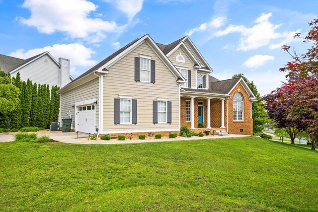 11 Tradewind Cir, Fishersville, VA 22939 - traditional-style home featuring cooling unit, a front yard, concrete driveway, a garage, and crawl space