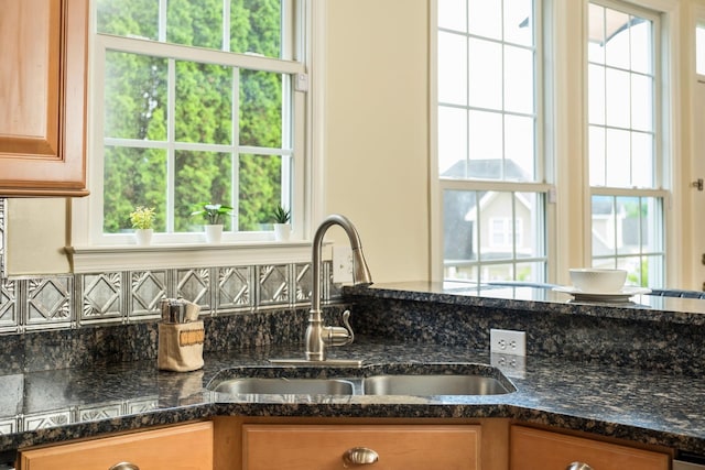 11 Tradewind Cir, Fishersville, VA 22939 - kitchen with a sink, plenty of natural light, decorative backsplash, and dark stone countertops