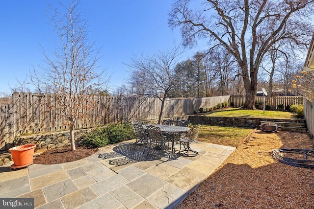 view of patio / terrace with a fenced backyard and outdoor dining space
