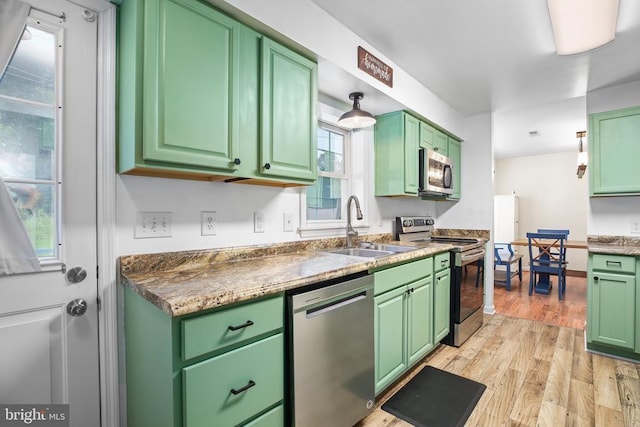 167 Fairview Rd, Louisa, VA 23093 - kitchen featuring appliances with stainless steel finishes, light wood-type flooring, and green cabinets