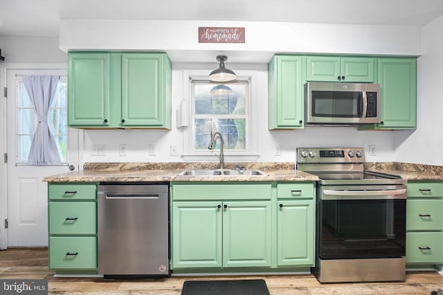 167 Fairview Rd, Louisa, VA 23093 - kitchen featuring stainless steel appliances, green cabinets, and light wood-style flooring