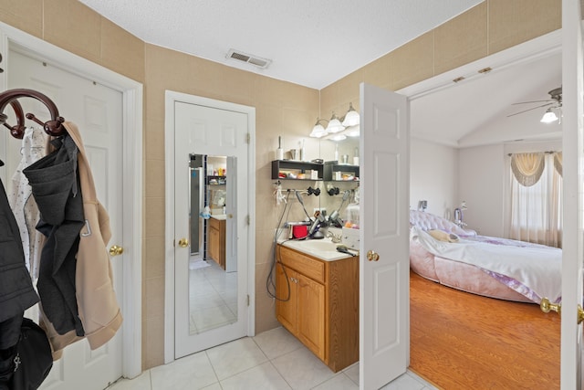 635 Long Meadow Rd, Fishersville, VA 22939 - full bathroom with tile patterned flooring, ensuite bathroom, ceiling fan, and visible vents