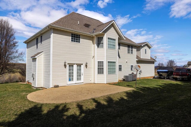 635 Long Meadow Rd, Fishersville, VA 22939 - back of property with a lawn, a patio area, central AC unit, and roof with shingles
