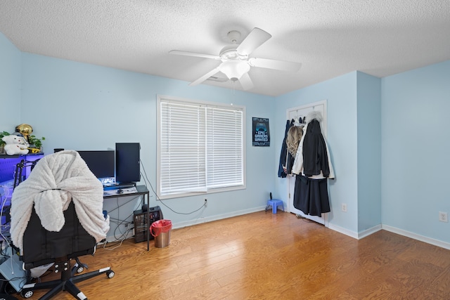 635 Long Meadow Rd, Fishersville, VA 22939 - office area featuring baseboards, ceiling fan, a textured ceiling, and wood finished floors