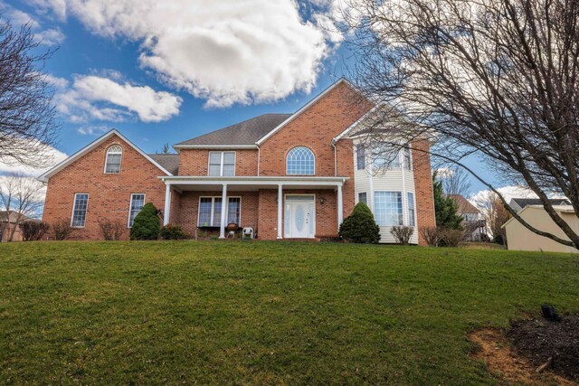 635 Long Meadow Rd, Fishersville, VA 22939 - traditional-style house with a front yard and brick siding