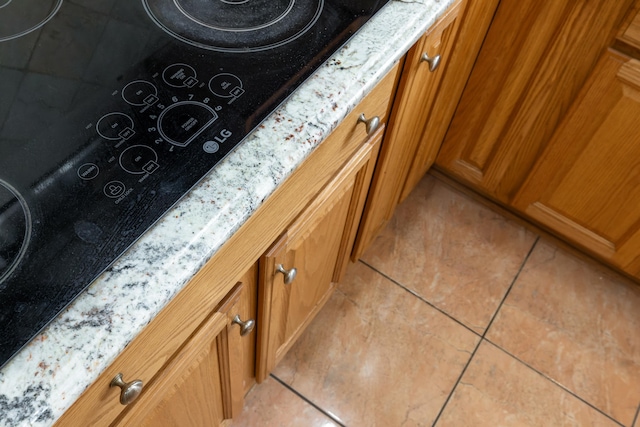 635 Long Meadow Rd, Fishersville, VA 22939 - room details featuring brown cabinetry and light stone counters