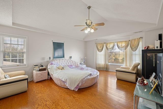 635 Long Meadow Rd, Fishersville, VA 22939 - bedroom featuring light wood-style floors, visible vents, lofted ceiling, and ceiling fan