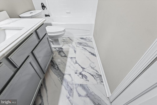 6903 Quitman Dr, Fredericksburg, VA 22407 - full bath featuring marble finish floors, toilet, vanity, and baseboards