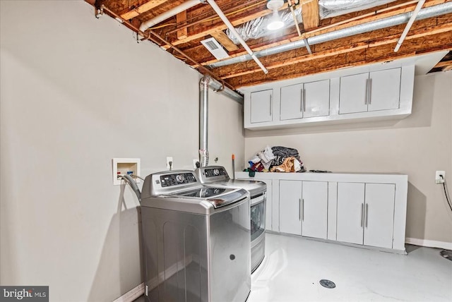 6903 Quitman Dr, Fredericksburg, VA 22407 - washroom with cabinet space and washing machine and clothes dryer