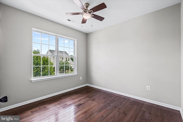 6903 Quitman Dr, Fredericksburg, VA 22407 - unfurnished room with dark wood-type flooring, baseboards, and ceiling fan