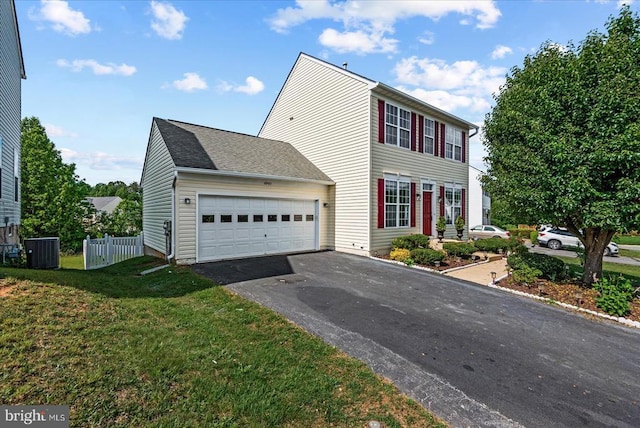 6903 Quitman Dr, Fredericksburg, VA 22407 - colonial house with central AC, a garage, and driveway