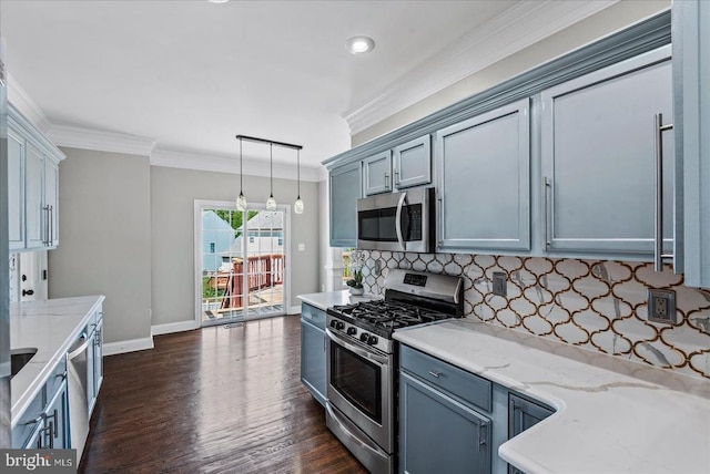6903 Quitman Dr, Fredericksburg, VA 22407 - kitchen with appliances with stainless steel finishes, backsplash, baseboards, dark wood finished floors, and hanging light fixtures