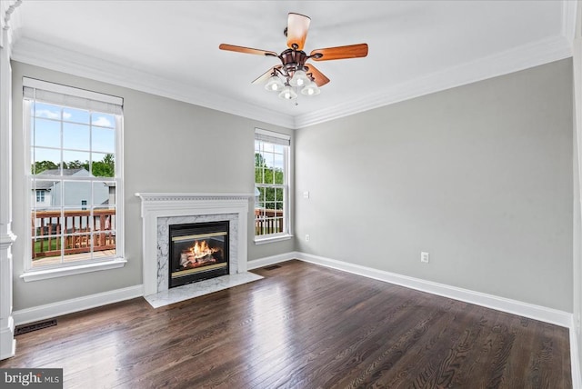 6903 Quitman Dr, Fredericksburg, VA 22407 - unfurnished living room with a premium fireplace, a ceiling fan, dark wood finished floors, baseboards, and crown molding