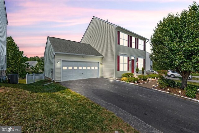 6903 Quitman Dr, Fredericksburg, VA 22407 - colonial home with central AC, driveway, and an attached garage