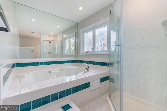 full bathroom featuring a garden tub, a shower stall, recessed lighting, and tile patterned floors