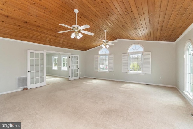 unfurnished living room featuring wooden ceiling, french doors, ornamental molding, healthy amount of natural light, and baseboards