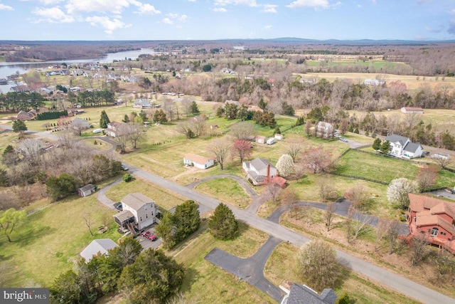 aerial overview of property's location with a nearby body of water