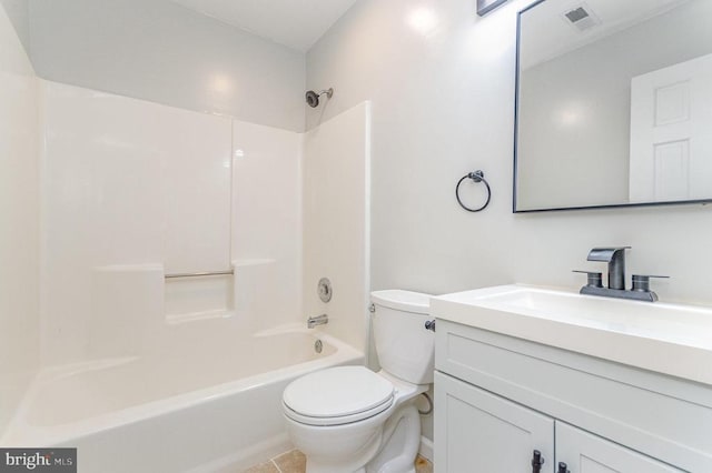 bathroom featuring toilet, vanity, and shower / bath combination