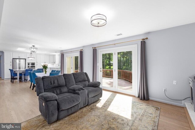 1550 Clover Dr, Fredericksburg, VA 22407 - living area with light wood-style floors