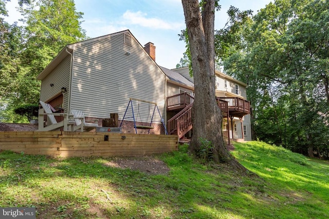 1550 Clover Dr, Fredericksburg, VA 22407 - back of house featuring a chimney, a wooden deck, stairs, and a yard