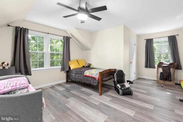 1550 Clover Dr, Fredericksburg, VA 22407 - bedroom featuring wood finished floors, lofted ceiling, and a ceiling fan