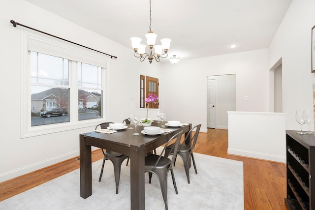 325 Petros Dr, Waynesboro, VA 22980 - dining room with a chandelier, light wood-style flooring, and baseboards