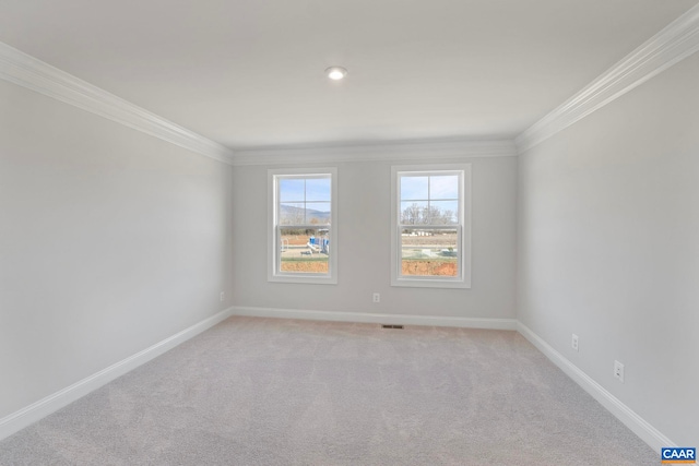 57 Hilah Ln, Charlottesville, VA 22901 - spare room featuring crown molding, light colored carpet, baseboards, and visible vents