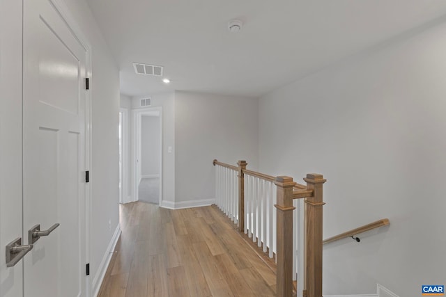 57 Hilah Ln, Charlottesville, VA 22901 - hall featuring recessed lighting, baseboards, visible vents, light wood-style floors, and an upstairs landing