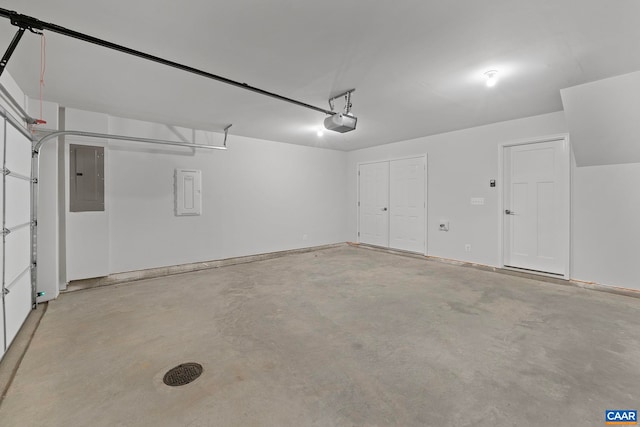 57 Hilah Ln, Charlottesville, VA 22901 - garage featuring electric panel and a garage door opener