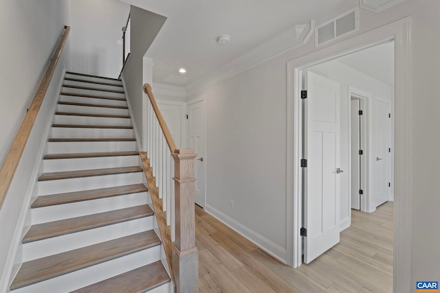 57 Hilah Ln, Charlottesville, VA 22901 - stairs featuring wood finished floors, visible vents, baseboards, ornamental molding, and recessed lighting
