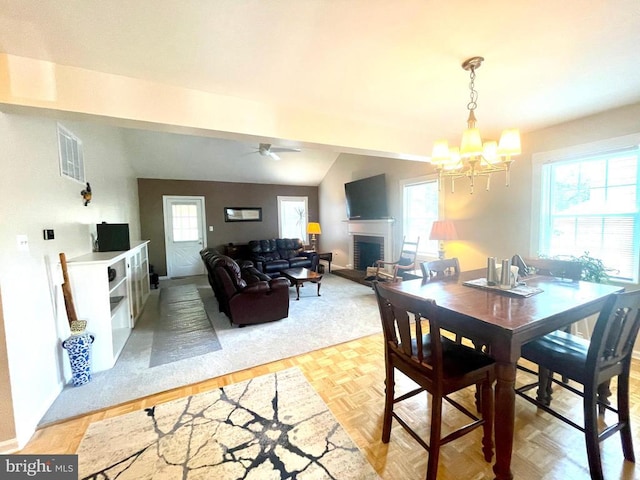 264 Fairfield Dr, Warrenton, VA 20186 - dining space featuring a fireplace, a chandelier, and plenty of natural light