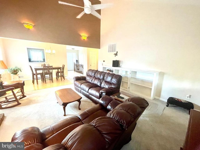 264 Fairfield Dr, Warrenton, VA 20186 - living room featuring carpet floors, ceiling fan, a chandelier, and a towering ceiling