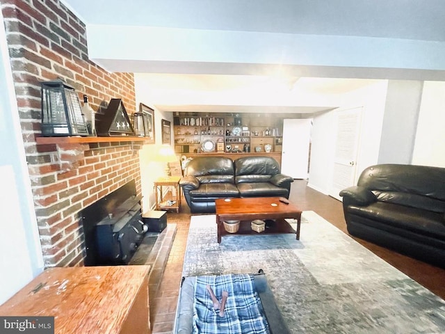 264 Fairfield Dr, Warrenton, VA 20186 - living room featuring a brick fireplace and wood finished floors