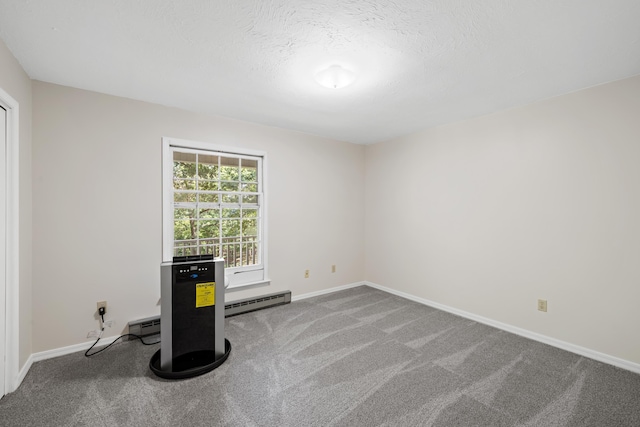 2035 Lee Jackson Hwy, Staunton, VA 24401 - empty room featuring carpet flooring, a baseboard heating unit, and a textured ceiling