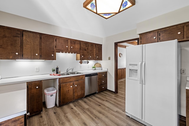 2035 Lee Jackson Hwy, Staunton, VA 24401 - kitchen with white fridge with ice dispenser, dishwasher, light wood-style flooring, and dark brown cabinetry