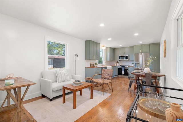 1867 Stage Junction Rd, Columbia, VA 23038 - living area featuring light wood-type flooring, recessed lighting, and baseboards