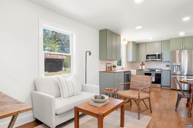 1867 Stage Junction Rd, Columbia, VA 23038 - living area with plenty of natural light, light wood finished floors, and recessed lighting