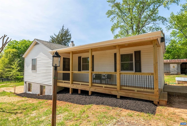1867 Stage Junction Rd, Columbia, VA 23038 - back of property with a shingled roof