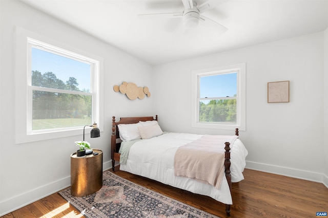 1867 Stage Junction Rd, Columbia, VA 23038 - bedroom featuring baseboards, wood finished floors, and ceiling fan