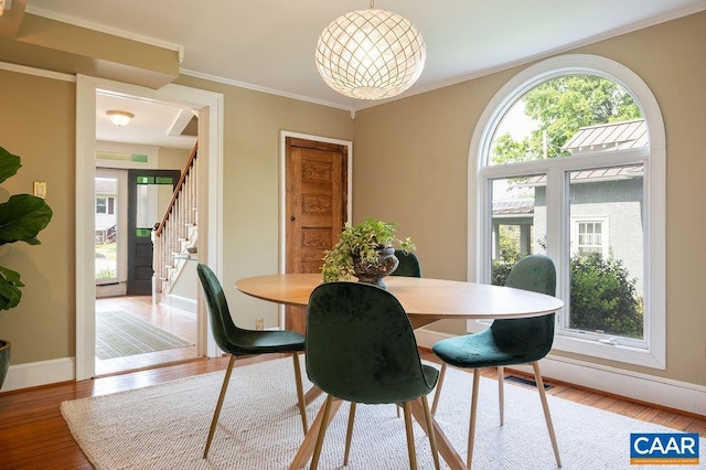 kitchen featuring beamed ceiling, wood ceiling, appliances with stainless steel finishes, and a sink