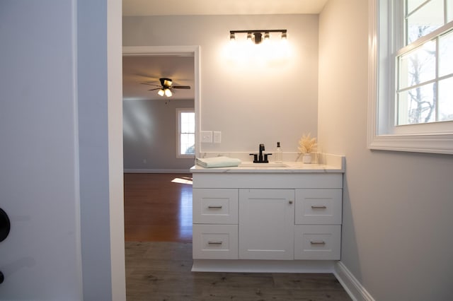 515A Grubert Ave, Staunton, VA 24401 - bathroom with wood finished floors, baseboards, ceiling fan, and vanity